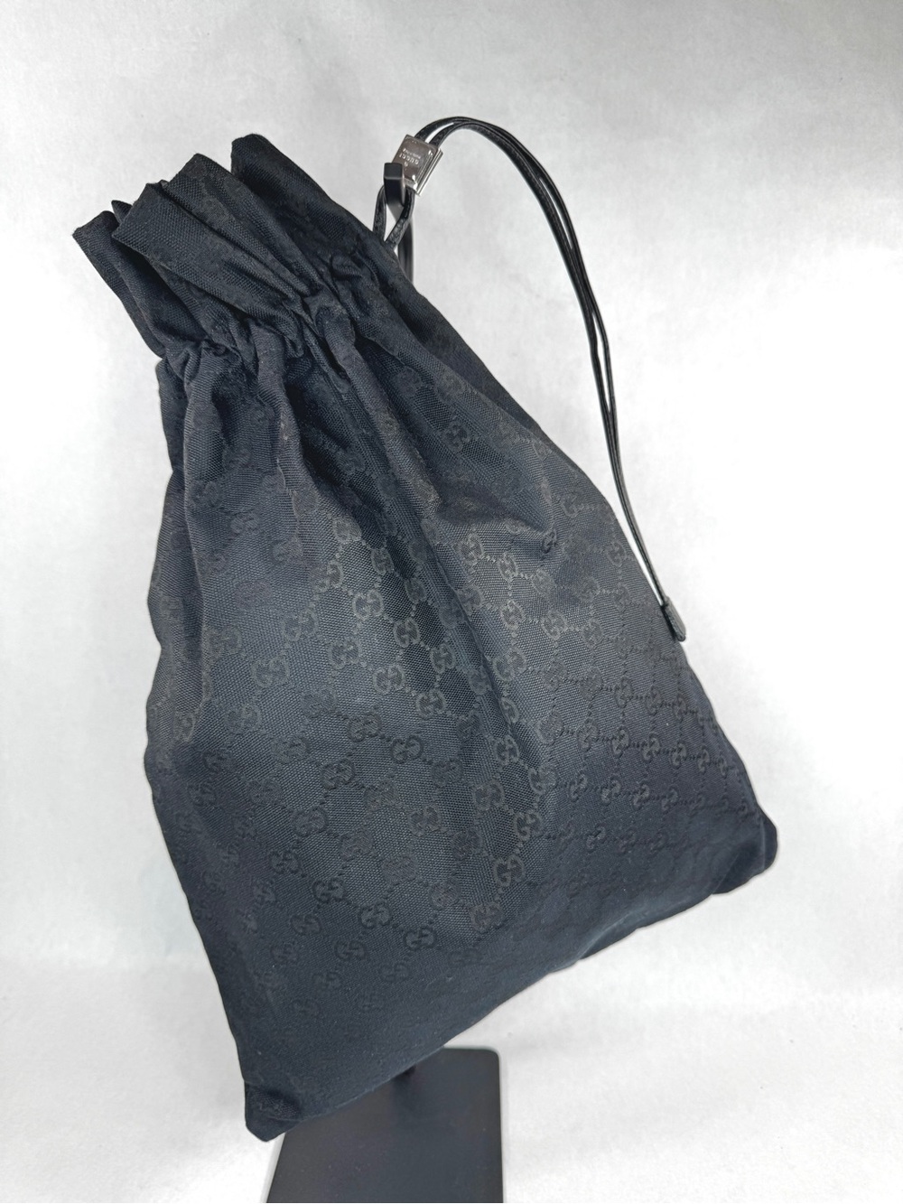 Gucci Black GG Canvas Drawstring Pouch Bag Leather Wrist Strap Made in Italy